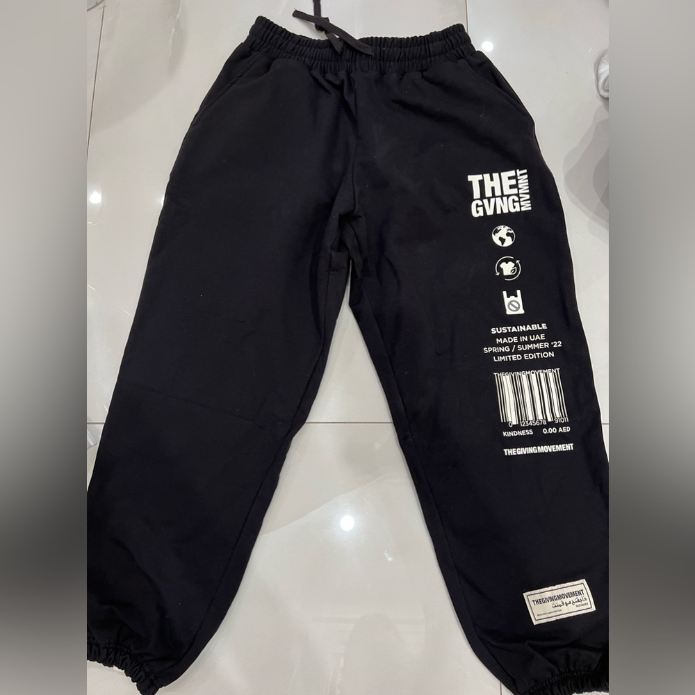 The Giving Movement black joggers